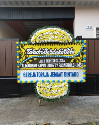 Papan Bunga Duka di Damer